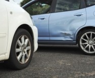 What is the best way to settle a parking lot accident?