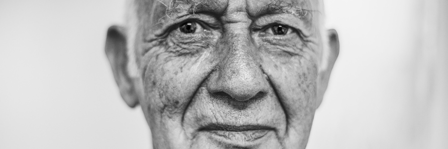Black and white photo of elderly man.