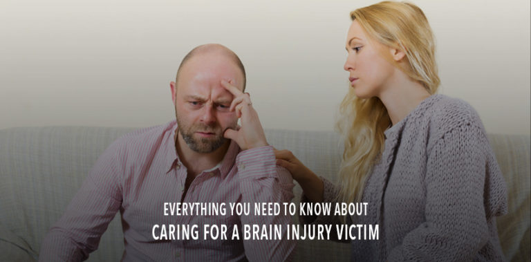 Woman comforting man coping with brain injury.