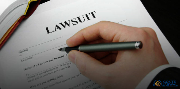Man filling out lawsuit paperwork